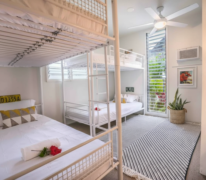 Chinaman’s Ocean Front Beach House 17 Bright bedroom with ocean view in Oahu Hawaii vacation rental