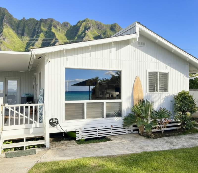 Chinaman’s Ocean Front Beach House 20 Beachfront Oahu vacation rental with sandy shoreline and clear water
